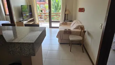 Uma televisão e/ou sistema de entretenimento em Beachfront Ap 314 Kariri Beach