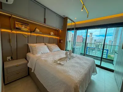 Uma cama ou camas num quarto em Studio 600m da praia