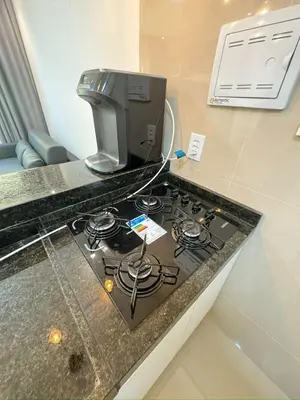 A cozinha ou kitchenette de Ap próx ao shopping com garagem, piscina e ar