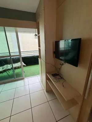 Uma televisão e/ou sistema de entretenimento em 1605 dos quartos Beach Class Vista Mar