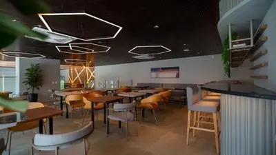 Uma área de estar em Beach Class Meireles Studio Rooftop 500m BeiraMar