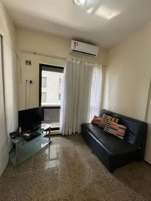 Uma área de estar em Av. Beira Mar - Flat com Localização Perfeita