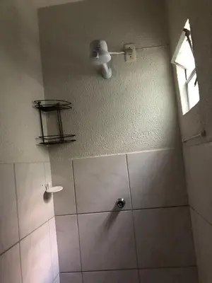 Uma casa de banho em Apartamentos Green