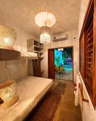 Uma cama ou camas num quarto em Casa Tartaruga Emboaca Trairí