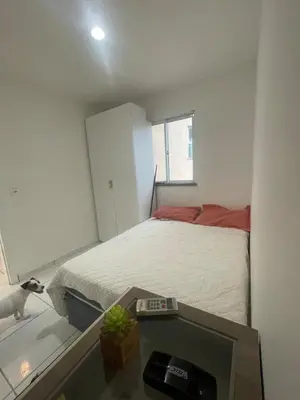 Uma cama ou camas num quarto em Ipê Street Hostel