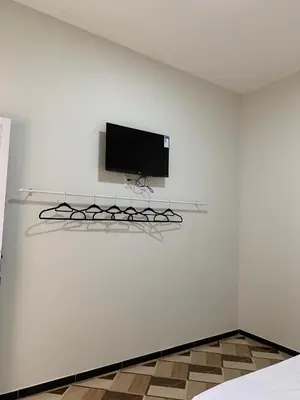 Uma televisão e/ou sistema de entretenimento em Pousada Garrida