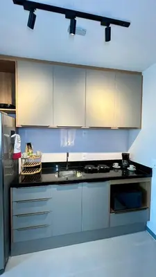 A cozinha ou kitchenette de Acorde com o Sol de Fortaleza Studio Charmoso no Meireles