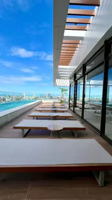 Uma varanda ou terraço em Acorde com o Sol de Fortaleza Studio Charmoso no Meireles