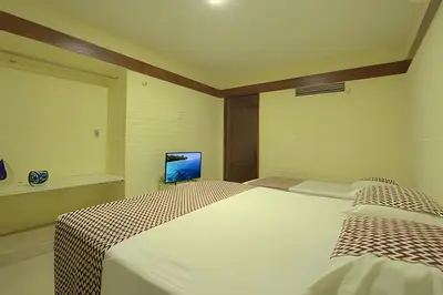 Uma cama ou camas num quarto em Linda no BEACH PARK-16 pessoas - HOUSINGCEARÁ