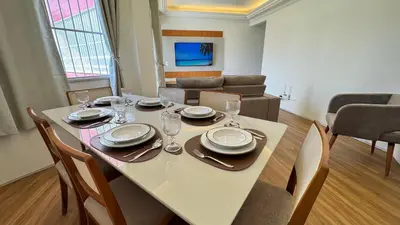 Uma televisão e/ou sistema de entretenimento em Amplo Apartamento com 3 Quartos em Fortaleza