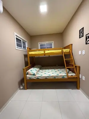 Uma cama ou camas num quarto em Residencial Portela 08C