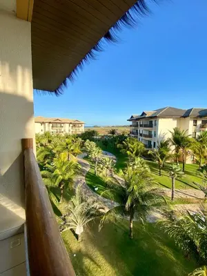 Um jardim no exterior de Flat da Cacau VG SUN Cumbuco