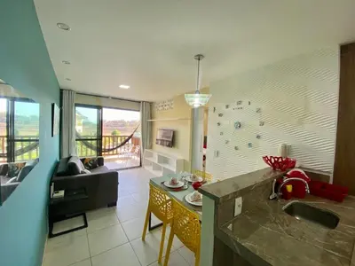 Uma área de estar em Flat da Cacau VG SUN Cumbuco