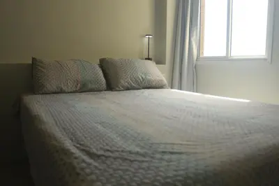 Uma cama ou camas num quarto em VG Fun Apto 502