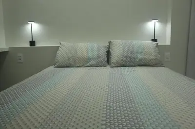 Uma cama ou camas num quarto em VG Fun Apto 502