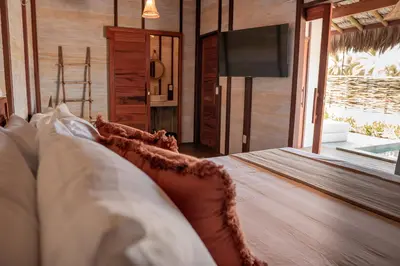 Uma cama ou camas num quarto em Vila Ammos Beach Houses