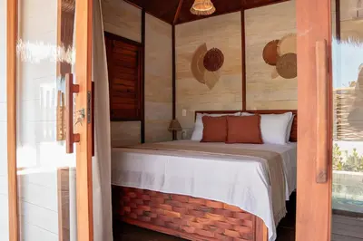 Uma cama ou camas num quarto em Vila Ammos Beach Houses