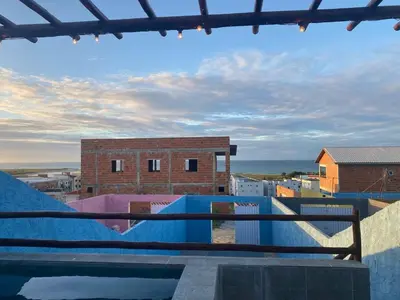 Uma varanda ou terraço em Chale Vista ao Mar Blue