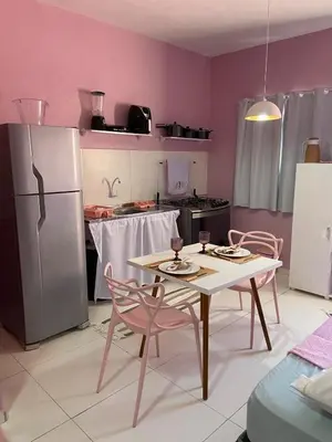 A cozinha ou kitchenette de Chale Vista ao Mar Pink
