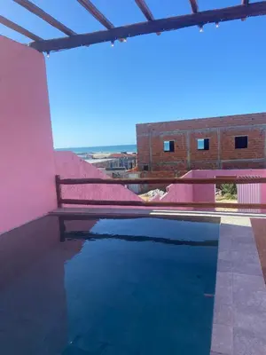 Uma varanda ou terraço em Chale Vista ao Mar Pink