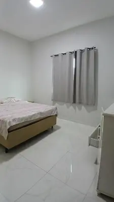 Uma cama ou camas num quarto em Casa Praia Paracuru