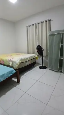Uma cama ou camas num quarto em Casa Praia Paracuru