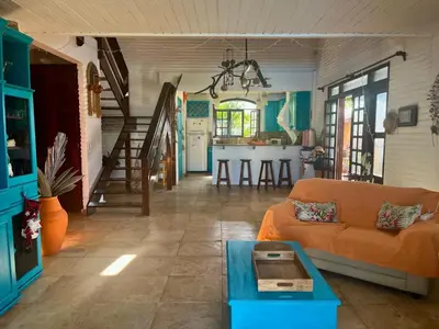 Uma área de estar em POUSADA Coisa Mais Linda e Massagem