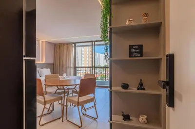 Uma área de estar em JSmart Guararapes #502 - Flat moderno by Carpediem