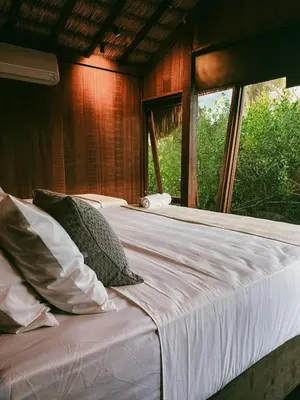 Uma cama ou camas num quarto em Vila Moitas casa YARA