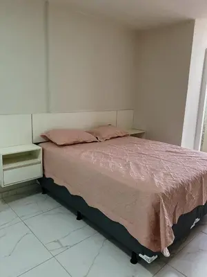 Uma cama ou camas num quarto em Apartamento Inteiro 3 camas AP305