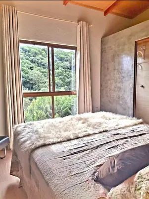 Uma cama ou camas num quarto em Casa Florença Guaramiranga
