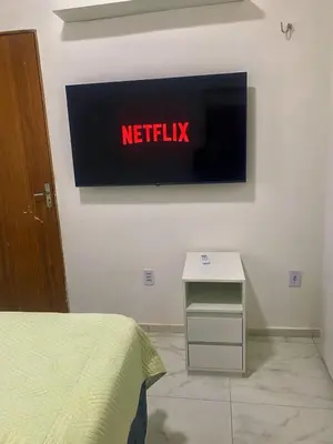 Uma televisão e/ou sistema de entretenimento em Apto compacto para familia 403