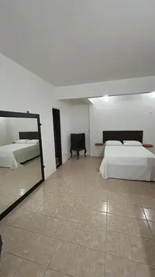 Uma cama ou camas num quarto em Pousada Marazul