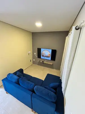 Uma televisão e/ou sistema de entretenimento em Triplex Dunas - Flecheiras