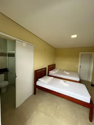 Uma cama ou camas num quarto em Triplex Dunas - Flecheiras