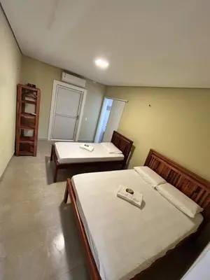 Uma cama ou camas num quarto em Triplex Dunas - Flecheiras