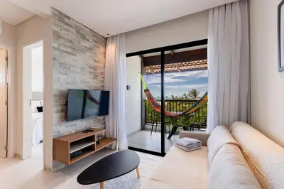 Uma televisão e/ou sistema de entretenimento em Miami House Cumbuco por Carpediem