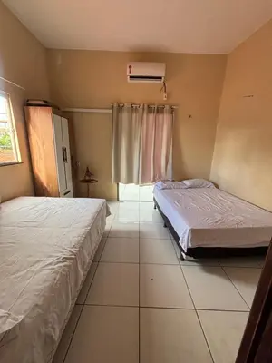 Uma cama ou camas num quarto em Casa jeri de prata