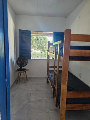 Uma cama ou camas num quarto em Sitio Coco Doce Aquiraz