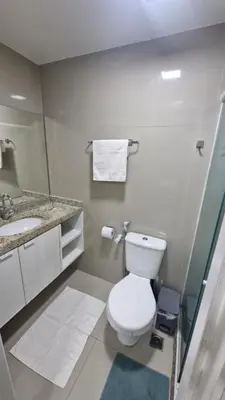 Uma casa de banho em Apt p 7 pessoas pé na areia com vista Mar
