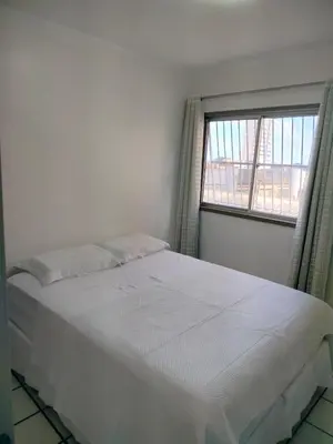 Uma cama ou camas num quarto em Estoril e Algarve