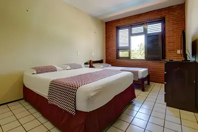 Uma cama ou camas num quarto em Super Luxo BEACH PARK - 20 Pessoas - HOUSINGCEARÁ