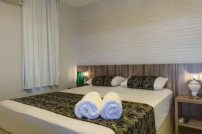 Uma cama ou camas num quarto em Mansão Luxo 32 Pessoas-BeachPARK - BY HousingCeara