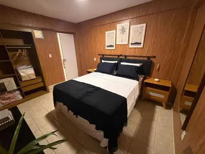 Uma cama ou camas num quarto em Benfica Village
