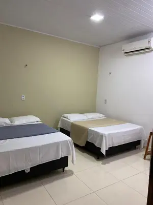 Uma cama ou camas num quarto em Flat flecheiras