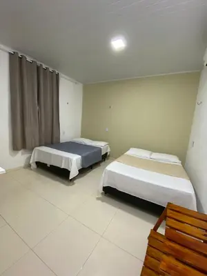 Uma cama ou camas num quarto em Flat flecheiras