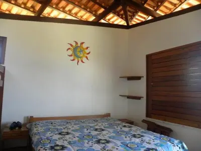 Uma cama ou camas num quarto em Kite House Taíba