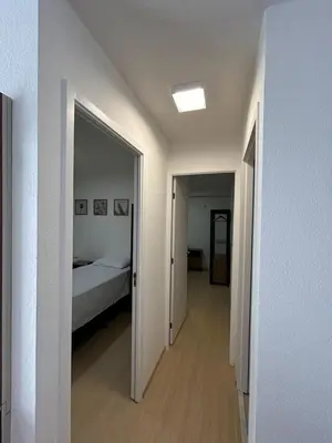 Uma cama ou camas num quarto em Apê na Praia do Futuro em Fortaleza - com Rooftop