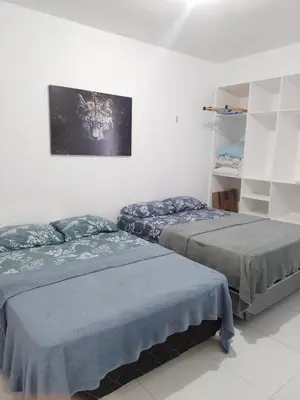 Uma cama ou camas num quarto em Cantinho feliz