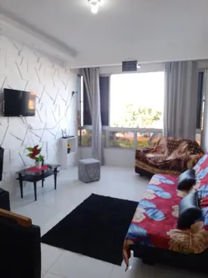 Uma área de estar em Cantinho feliz